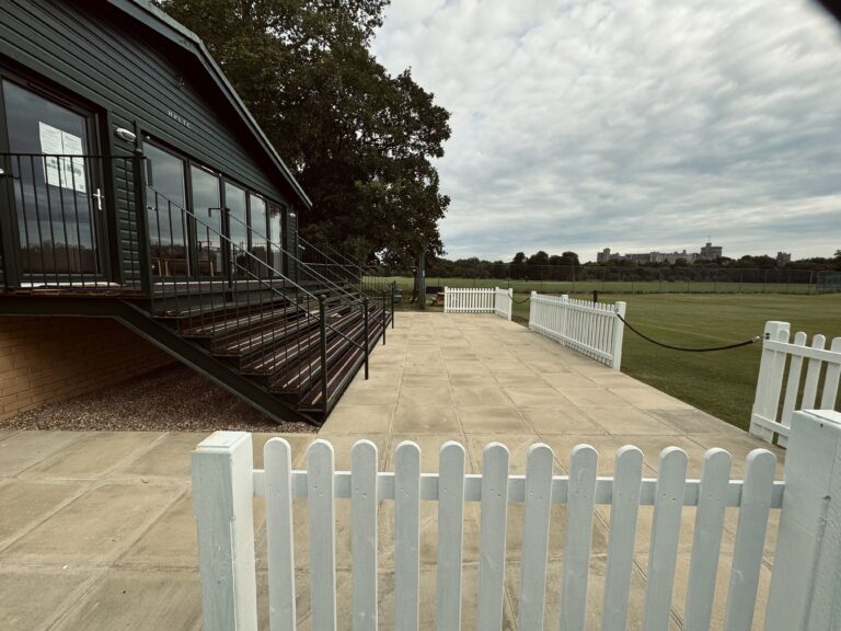 New Tennis clubhouse, front/side view and the Windsor castle in the backround.